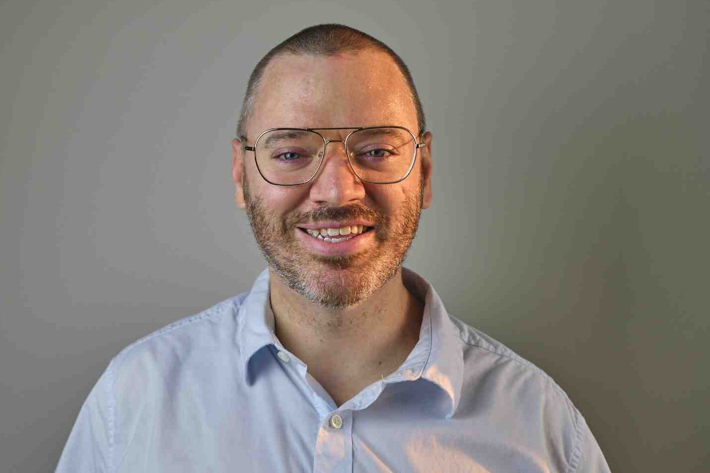 Brandon Carl, SEO professional, wearing a light blue shirt.